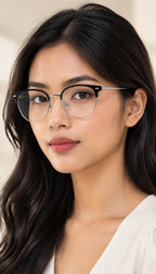 Green Whisper eyeglasses, worn by a model